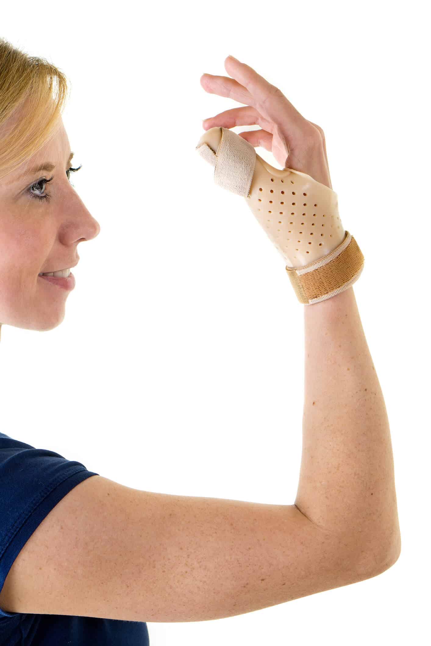 Young woman wearing a thumb brace